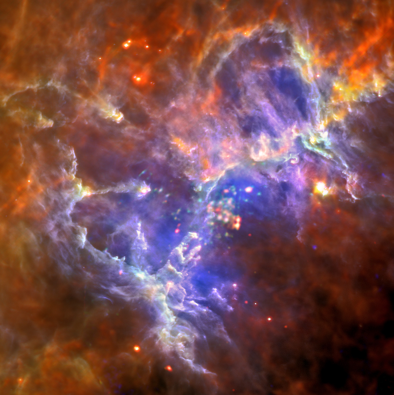 Detaljer i Ørnetåken. De unge, hete stjernene som sees i røntgen former de ekstremt kalde gassene og støvet rundt stjernehopen. Disse superkalde områdene danner solsystemer. Foto: ESA/Herschel/PACS/SPIRE/Hill, Motte, HOBYS Key Programme Consortium, ESA/XMM-Newton/EPIC/XMM-Newton-SOC/Boulanger