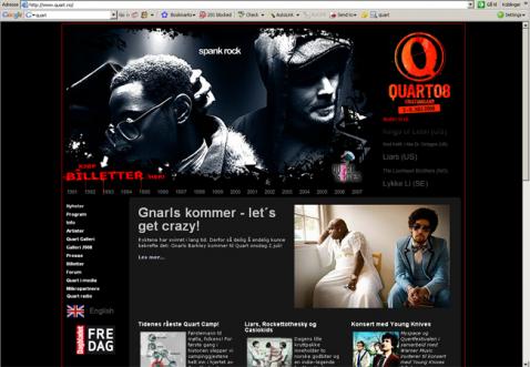 Quarts hjemmeside i sort, rødt og hvitt.