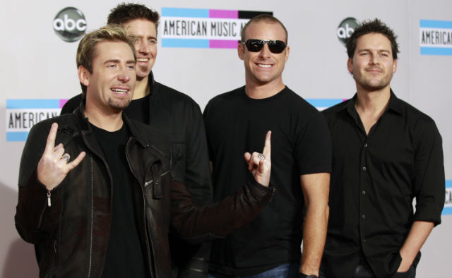 Nickelback på den røde løperen under American Music Awards 2011. Foto: Scanpix
